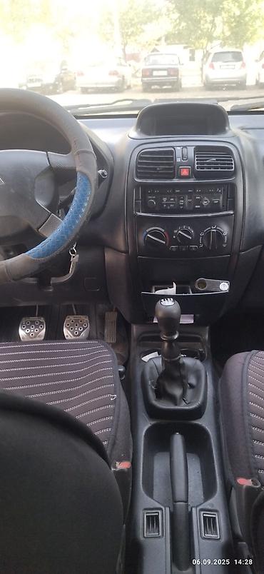 210 2 2: Mitsubishi Space Star: 2003 г., 1.3 л, Механика, Бензин, Универсал — 7