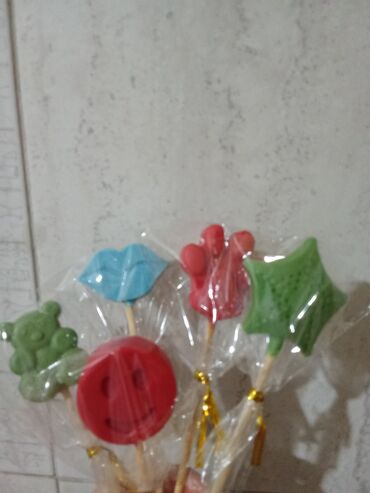 шоколадные розы: Шоколад на палочке фигурные в индивидуальной упаковке. -