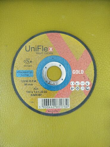 Digər tikinti materialları: UniFlex X-in qızılı rəngdə olan dairəvi kəsici diski. Diametri 125 mm