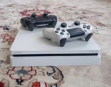 продаю playstation 4: Продается ps4 слим непрошитая память 500гб. при осмотре сами