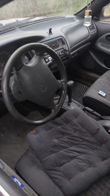 Toyota Corolla: 1996 г., 1.6 л, Автомат, Бензин, Седан