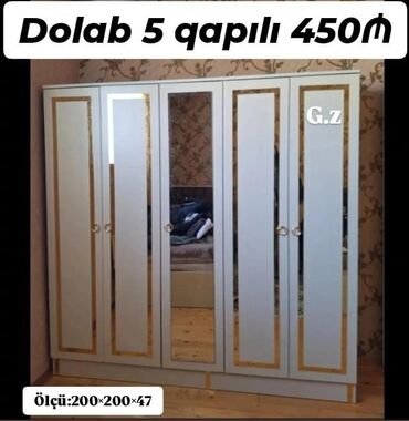 Komodlar: *Dolab 5 qapılı 450Azn* *İstehsal Rusiya Laminat 18/lik qalınlıqda*