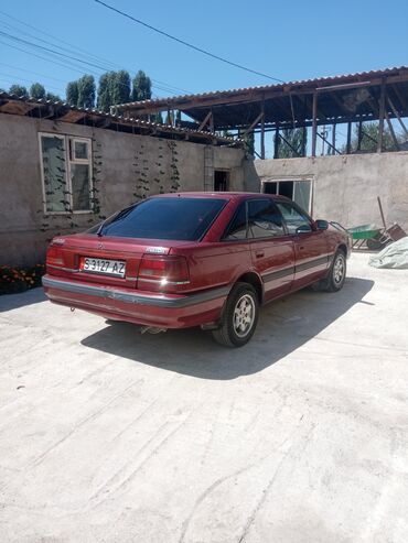 посадка авто: Mazda 626: 1991 г., 2 л, Механика, Бензин, Хэтчбэк