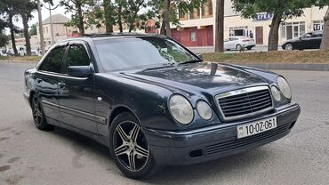 mersedes cewqa: Mercedes-Benz E 230: 2.3 l | 1996 il Sedan