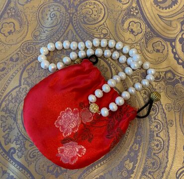 qizil boyunbagi: Жемчужное ожерелье