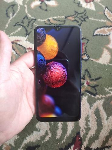 note 14: Samsung Galaxy A10, Б/у, 32 ГБ, цвет - Синий, 2 SIM — 2