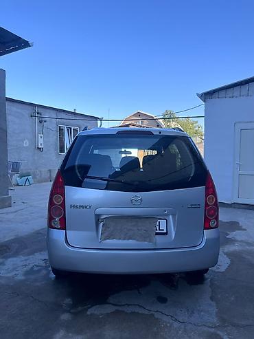 саната желтый: Mazda PREMACY: 2004 г., 1.8 л, Механика, Бензин, Универсал — 8