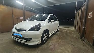 чехлы бу: Honda Fit: 2002 г., 1.3 л, Вариатор, Бензин, Хэтчбэк — 5