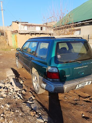 елктро скутер: Subaru Forester, первое поколение (SF). Зеленый универсал 5 дв.