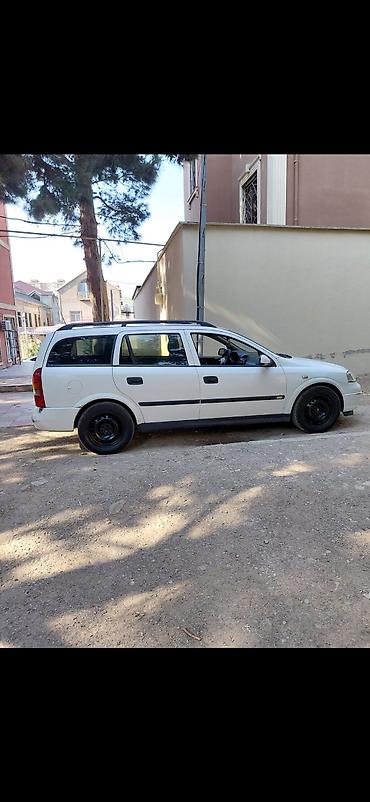 opel difuzer: Opel Astra Universal – ağ rəng Xüsusiyyətlər: - Kuzov: universal — 4
