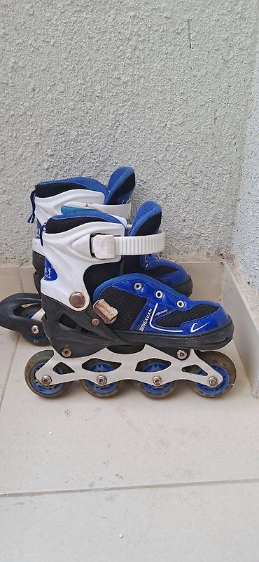 İdman və istirahət: Uşaq üçün tənzimlənən inlayn konki (roller) - Rəng: mavi-ağ-qara - — 1