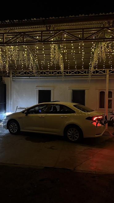 электра машына: Toyota Corolla: 2019 г., 1.8 л, Гибрид, Седан — 6