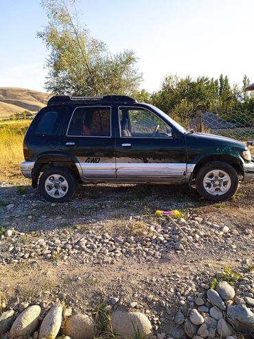обмен с моей доплатой: Kia Sportage: 1995 г., 2.2 л, Механика, Дизель