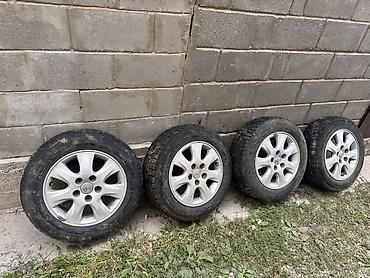 Комплект из 4 колес на дисках Toyota. - Размер шин: 195/65 R15