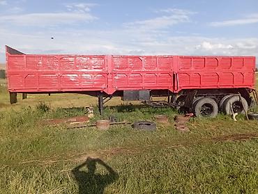 howo 310: Полуприцеп‑бортовой (зерновоз/универсальный) красного цвета. - — 3