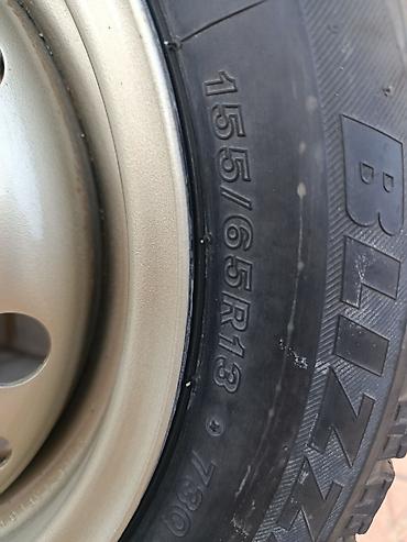 жели: Пара зимних колес в сборе на штампованных дисках. - Шины: Bridgestone — 4