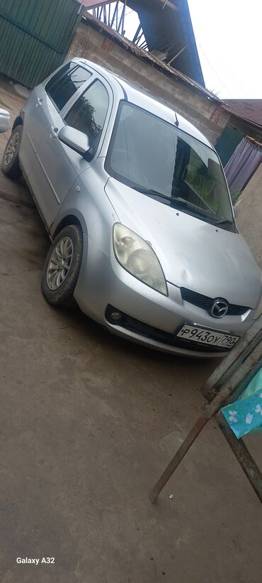 машина ис: Mazda Demio: 2006 г., 1.5 л, Автомат, Бензин, Хэтчбэк