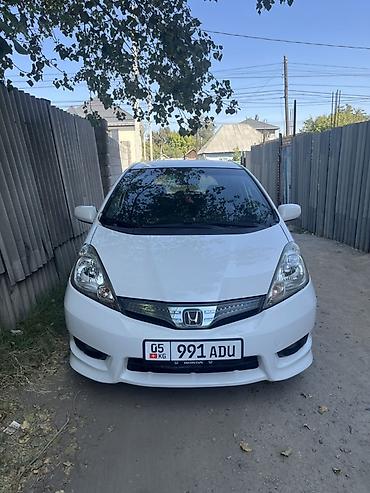 тенир тоо: Honda Fit: 2009 г., 1.5 л, Автомат, Бензин, Хетчбек — 1