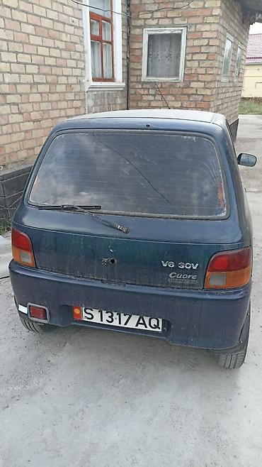 нур мото: Daihatsu Cuore: 1999 г., Механика, Хэтчбэк — 1