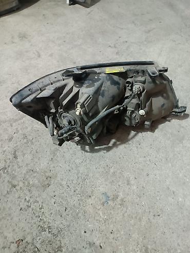 лев: Передняя левая фара Toyota Б/у, Оригинал — 5