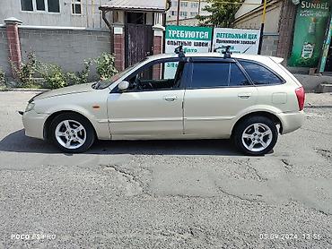 шторка фит: Mazda 323: 2003 г., 1.6 л, Механика, Бензин, Универсал — 4