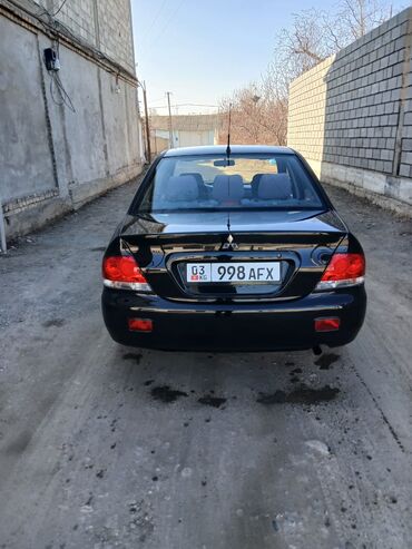 Mitsubishi: Mitsubishi Lancer: 2003 г., 1.6 л, Механика, Седан — 6