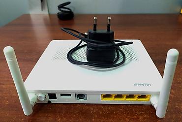 katv tv: Fiber optik xəttə qoşulan GPON modem Huawei, son modellərdəndir — 1