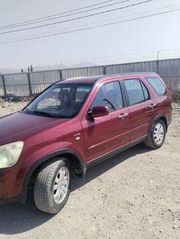 передвижные дома: Honda CR‑V II (рестайлинг), бордовый кроссовер Характеристики и