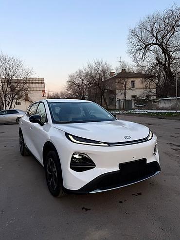 на электромобиль: Электромобиль кроссовер (белый), бренд “i01” на эмблеме. Кузов и — 8