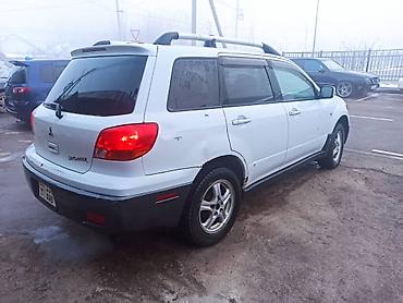 где принимают аккумуляторы: Mitsubishi Outlander: 2003 г., 2.4 л, Автомат, Газ, Кроссовер — 2