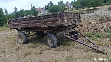 015 maşını: Mavi rəngli MTZ 80 tipli traktor lafet və mala sürülən traktordu real — 7