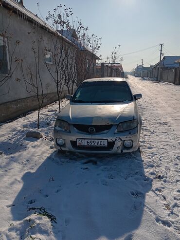 Mazda: Mazda 323: 2002 г., 1.6 л, Механика, Бензин, Хэтчбэк