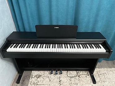 Цифровое пианино YAMAHA в корпусе под дерево, цвет черный. -