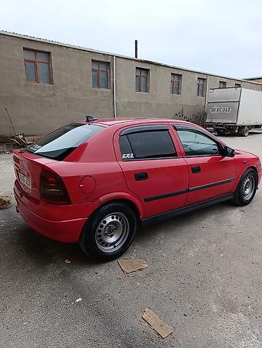 opel təkərləri: 15 diy 4 bolt meqan tekerleri 205.65.15 disk tekerlerin 2 si normal — 2