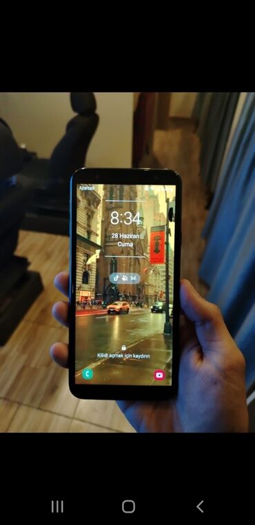 telefon r: Samsung Galaxy J4 Plus, 32 ГБ, цвет - Черный, Две SIM карты