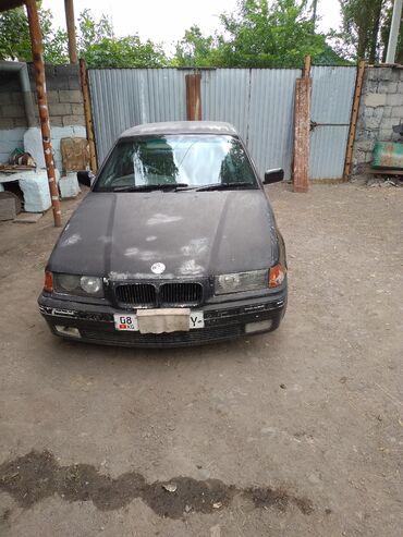 ангельские глазки на бмв: Седан BMW E36 черного цвета. Автомобиль требует внимания к кузову