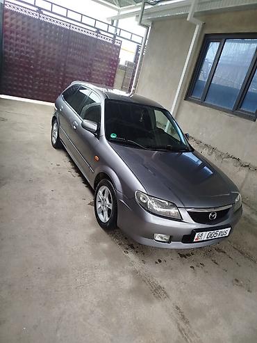 Mazda: Mazda Familia: 2003 г., Бензин, Универсал — 8