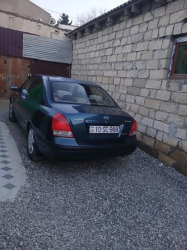 orta panel: Hyundai Elantra: 2 l | 2003 il Sedan — 3