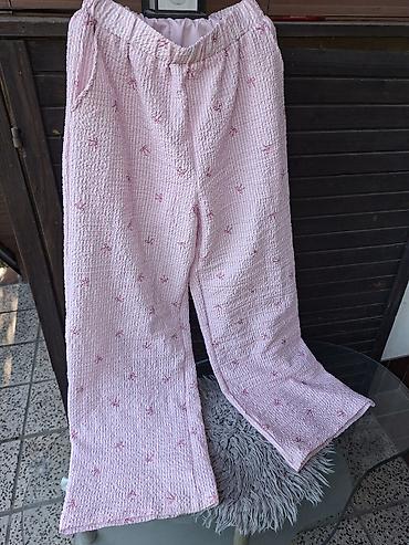 adidas pertle: Roze ženske pantalone od laganog, teksturiranog materijala sa sitnim — 1