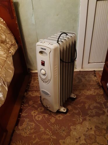 экономичный обогреватель для дома: Nikai yağ radiator tipli elektrikli isidici - 6 bölməli metal korpus