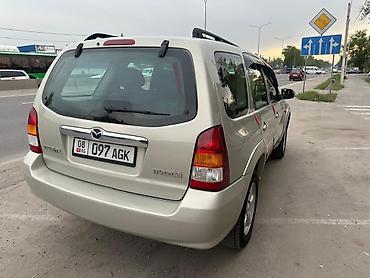 Транспорт: Mazda Tribute: 2004 г., 2.3 л, Механика, Бензин, Кроссовер — 3