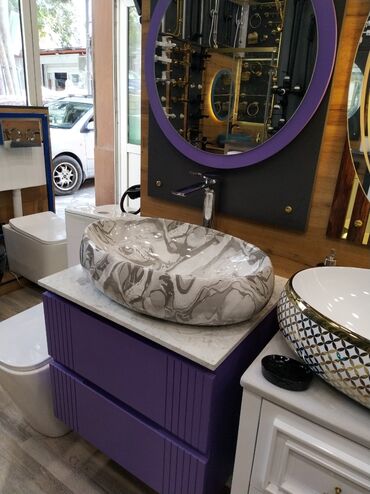 moydadir hamam ucun: Mərmər naxışlı, oval formalı, dəbli lavabo. Tünd bənövşəyi rəngdə, iki