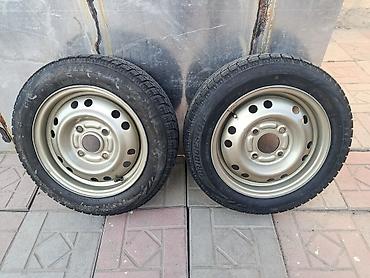 жели: Пара зимних колес в сборе на штампованных дисках. - Шины: Bridgestone — 1