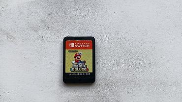 nintendo dsi: Nintendo Switch üçün oyun kartricləri və qutu təqdim olunur. Dəstə — 4