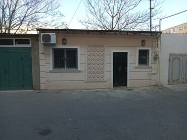 mərdəkanda bağ evi: Merdekanda tam merkezde,40 kvkeyfiyyetli temirli ofisher bir