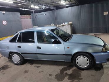 решетка нексия: Элегантный седан Daewoo Nexia 2010. 1.6L в светло-голубом цвете