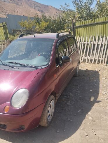 мини электромобиль: Автомобиль Daewoo Matiz бордового цвета, компактный городской хэтчбек