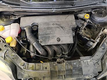 лак авто: Mazda 2, хэтчбек, механическая коробка передач. объем 1.3 — 2