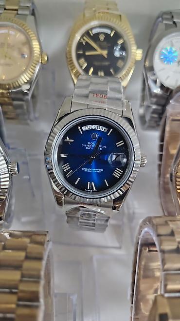kisi sepi: Rolex Oyster Perpetual Day‑Date kolleksiyasından kişi qol saatları — 1