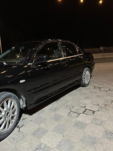 диска на авто: Mitsubishi Carisma: 2003 г., 1.8 л, Автомат, Бензин, Лифтбек — 5